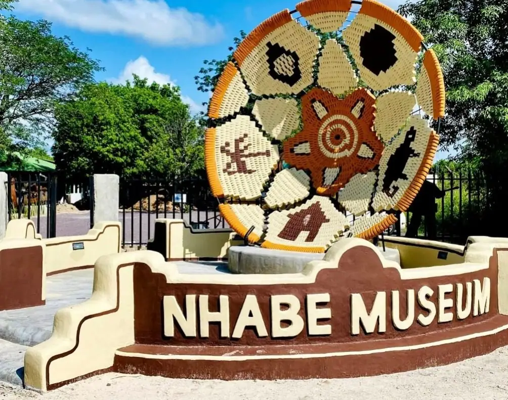 The entrance sign of the Nhabe Museum in Maun